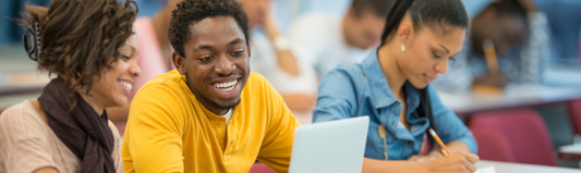 Students researching in a classroom